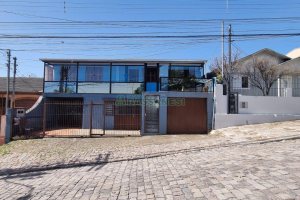Casa com 412m², 4 dormitórios, 4 vagas, no bairro Santa Catarina em Caxias do Sul para Comprar