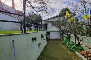 Casa com 172m², 3 dormitórios, 2 vagas, no bairro Charqueadas em Caxias do Sul para Comprar