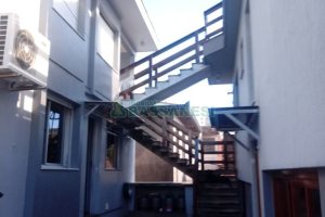 Casa com 313m², 3 dormitórios, 3 vagas, no bairro Rio Branco em Caxias do Sul para Comprar