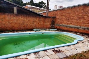 Casa com 300m², 6 dormitórios, 2 vagas, no bairro Rio Branco em Caxias do Sul para Comprar