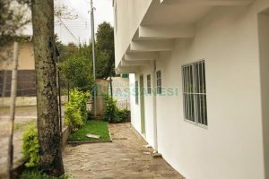 Casa Comercial com 254m², 8 dormitórios, 3 vagas, no bairro Jardim América em Caxias do Sul para Alugar