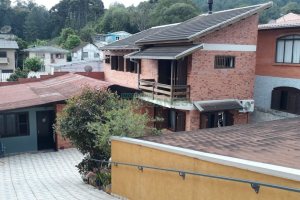 Casa, 5 dormitórios, 4 vagas, no bairro Cruzeiro em Caxias do Sul para Comprar