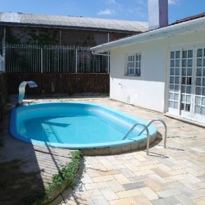 Casa com 157m², 3 dormitórios, 3 vagas, no bairro Santa Catarina em Caxias do Sul para Comprar