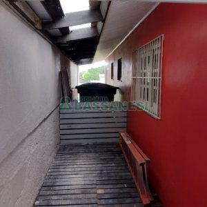 Casa com 215m², 5 dormitórios, 2 vagas, no bairro Charqueadas em Caxias do Sul para Comprar