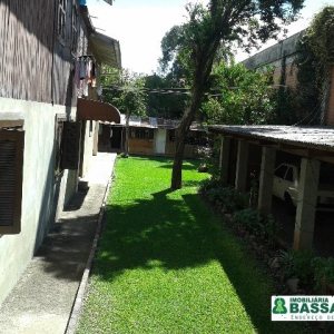 Casa com 250m², 7 dormitórios, 4 vagas, no bairro Santa Catarina em Caxias do Sul para Comprar