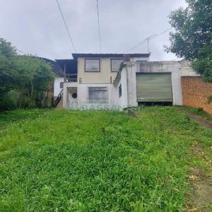Casa com 166m², 2 dormitórios, 1 vaga, no bairro Rio Branco em Caxias do Sul para Comprar