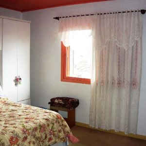 Casa com 412m², 4 dormitórios, 4 vagas, no bairro Santa Catarina em Caxias do Sul para Comprar