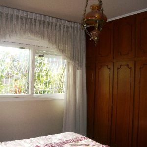 Casa com 250m², 4 dormitórios, 5 vagas, no bairro Pio X em Caxias do Sul para Comprar