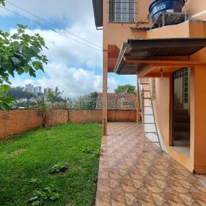 Casa com 219m², 6 dormitórios, 4 vagas, no bairro Panazzolo em Caxias do Sul para Comprar