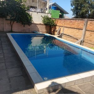 Casa com 690m², 4 dormitórios, 2 vagas, no bairro Diamantino em Caxias do Sul para Comprar