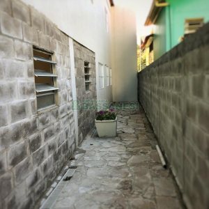 Casa Comercial com 254m², 8 dormitórios, 3 vagas, no bairro Jardim América em Caxias do Sul para Alugar