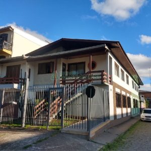 Casa com 82m², 3 dormitórios, 1 vaga, no bairro Pio X em Caxias do Sul para Comprar