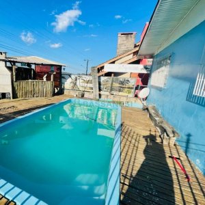 Casa com 351m², 6 dormitórios, 4 vagas, no bairro Treviso em Caxias do Sul para Comprar