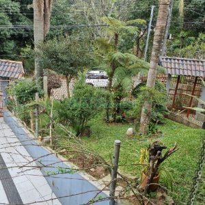 Casa com 295m², 4 dormitórios, 2 vagas, no bairro Charqueadas em Caxias do Sul para Comprar