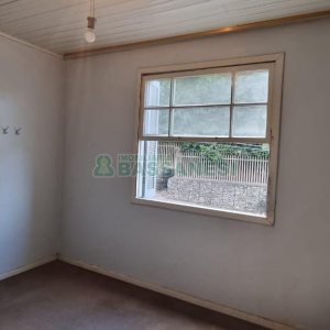 Casa com 168m², 2 dormitórios, 1 vaga, no bairro Centro em Caxias do Sul para Comprar