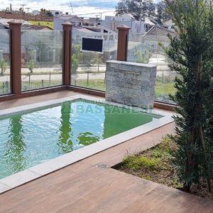 Casa com 108m², 3 dormitórios, 2 vagas, no bairro Moinhos de Vento em Caxias do Sul para Comprar