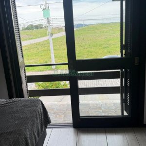 Sobrado com 75m², 2 dormitórios, 1 vaga, no bairro Desvio Rizzo em Caxias do Sul para Comprar