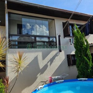 Casa com 297m², 4 dormitórios, 2 vagas, no bairro Rio Branco em Caxias do Sul para Comprar