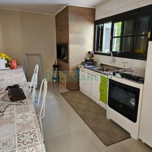 Casa com 297m², 4 dormitórios, 2 vagas, no bairro Rio Branco em Caxias do Sul para Comprar