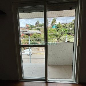 Casa com 96m², 2 dormitórios, 1 vaga, no bairro Charqueadas em Caxias do Sul para Alugar