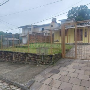 Casa com 78m², 2 dormitórios, 1 vaga, no bairro Charqueadas em Caxias do Sul para Alugar