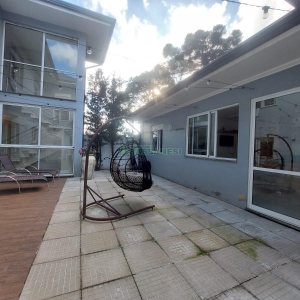 Casa com 420m², 4 dormitórios, 4 vagas, no bairro Interlagos em Caxias do Sul para Alugar